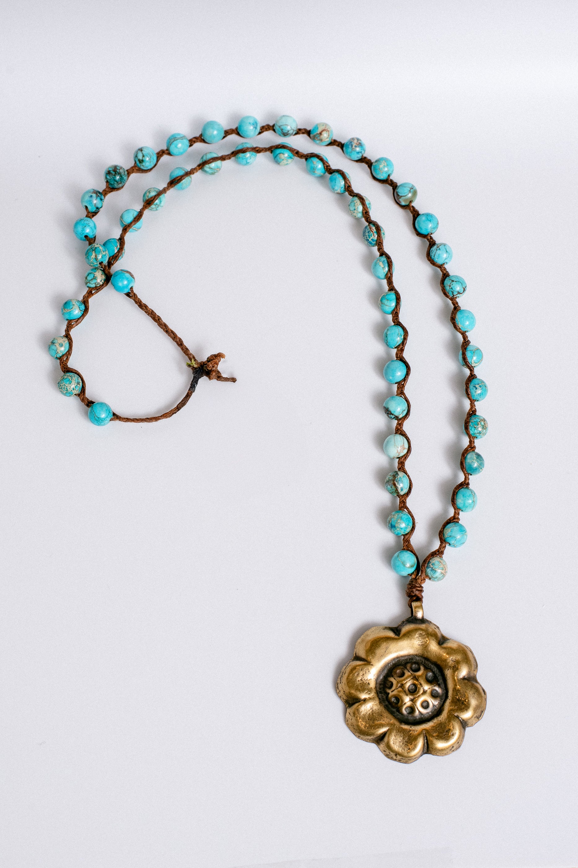 Jonas & Muse Pressed Gold Flower on Turquoise